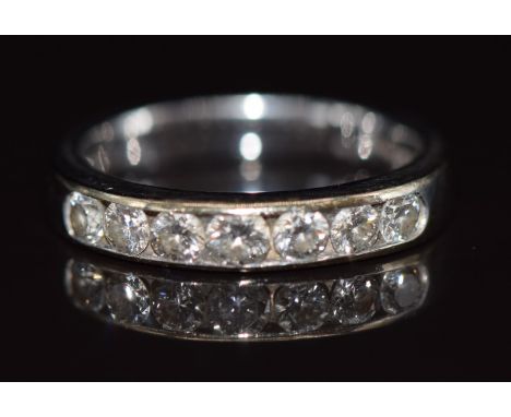 An 18ct white gold ring set with five diamonds totalling approximately 0.5ct, 3.4g, size J/K&nbsp;