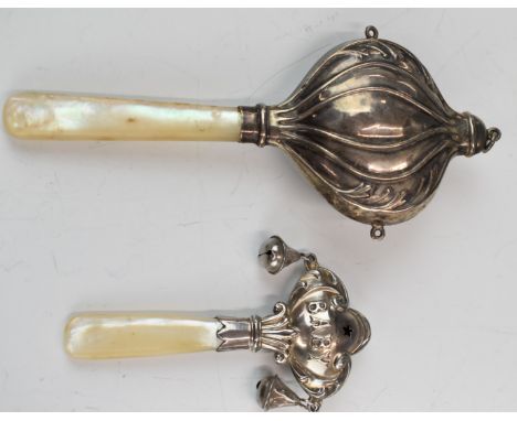 Two hallmarked silver mother of pearl handled baby's rattles, Chester 1920, maker Adie & Lovekin Ltd, the other Birmingham 19