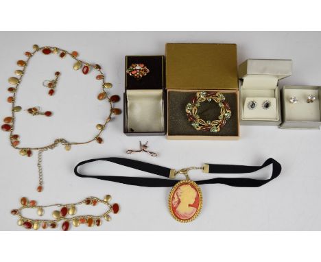 A collection of costume jewellery including yellow metal ring set with an opal, coral, tiger's eye, Exquisite brooch, etc&nbs