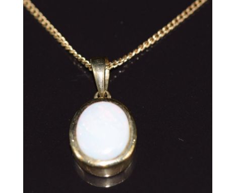 A 9ct gold pendant set with a white opal, on 9ct gold chain, 3.2g&nbsp;