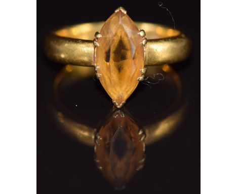 A 22ct gold ring set with a marquise cut citrine, London 1928, 8.6g, size R