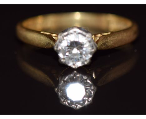 An 18ct gold ring set with a round cut diamond of approximately 0.4ct, 3.3g, size N