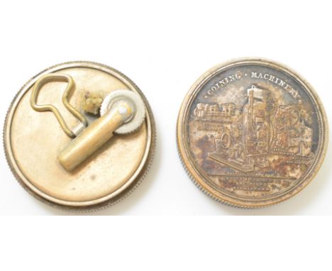 Taylor and Challen Ltd novelty or advertising cigarette lighter in the form of a stack of seven coins or tokens, the top coin