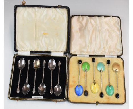 Two cased sets of hallmarked silver spoons, comprising a coloured guilloché enamel backed set, Birmingham 1937, maker&nbsp;He