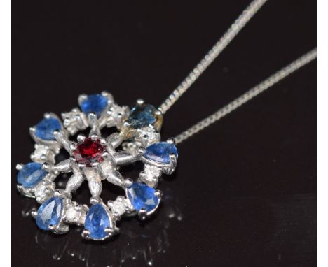 A 9k white gold pendant set with a ruby, sapphires and diamonds with two 9k white gold chains, 4g&nbsp;
