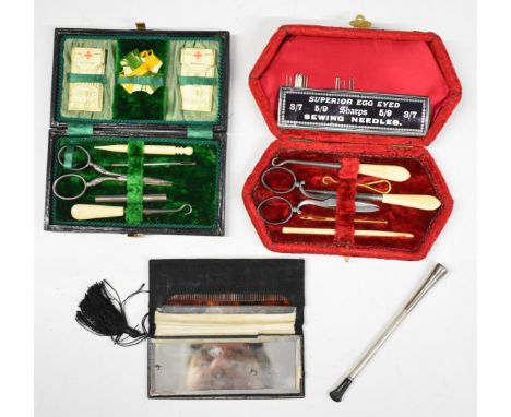 Two cased 19th or early 20th century sewing sets, with cut steel scissors and bone handled tools, both with needles to inside