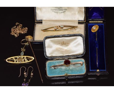 A 9ct gold stick pin set with a gold nugget, 9ct gold stick pin set with a pearl in antique box, Edwardian 15ct gold brooch s