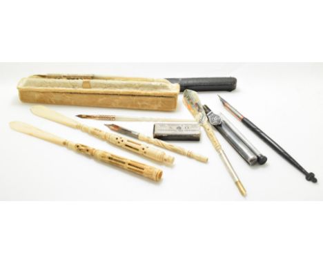 Seven various fountain and dip pens and propelling pencils, some bone with carved decoration and stanhopes, others with mothe