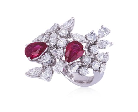 A BURMESE RUBY AND DIAMOND CLUSTER BY LARRY JEWELLERY Featuring two pear cut Burmese rubies weighing approximately 1.45 Cts t