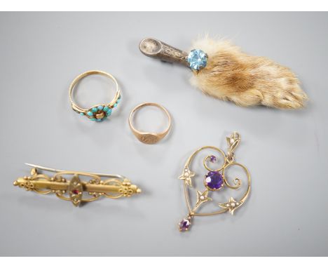 A small collection of jewellery to include an Edwardian amethyst and seed pearl pendant, two rings including Victorian yellow