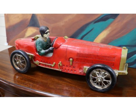 A resin model of an early 20th century Grand Prix racer in a Bugatti type 35