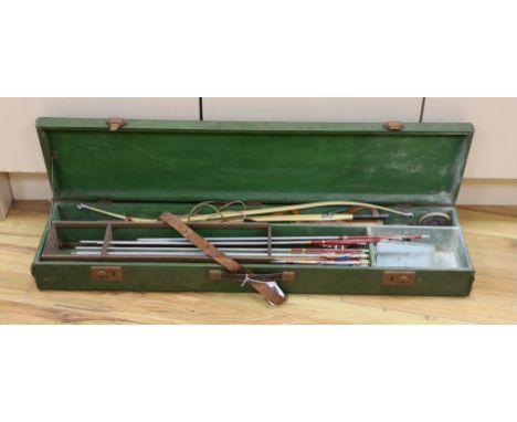 A vintage archery set in cased green box