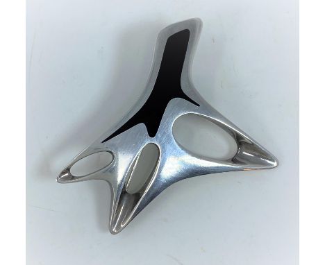 A Georg Jensen silver brooch designed by Henning Koppel, modernist abstract design with black enamel decoration, stamped Geor