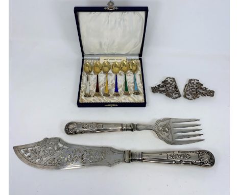 A white metal nurses belt buckles, a boxed set of six enamel Danish silver tea spoons (some loss to enamel) and a pair of sil