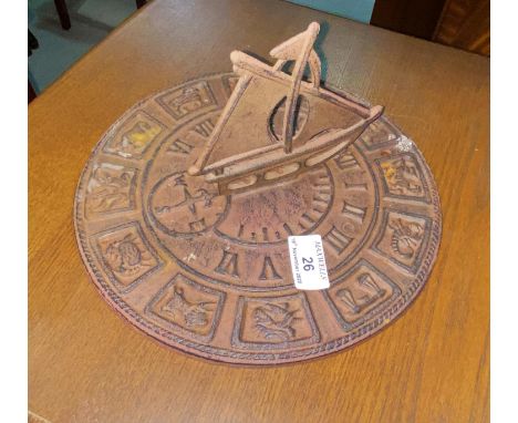A cast iron sundial; a cherub weather vane; a swing sign:  "Antiques &amp; Collectibles" 