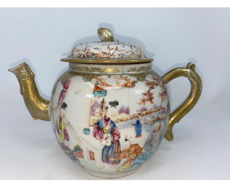 A Chinese tea pot decorated with various traditional scenes with highlights of gilt decoration (hairline cracks, restoration 