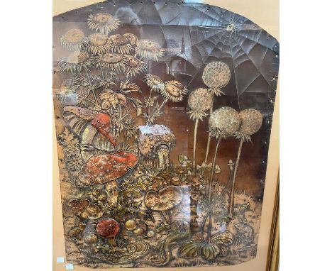 An Arts & Crafts leather firescreen panel worked in relief with mushrooms; etc., 68 x 52 cm, framed and glazedThe holes for t
