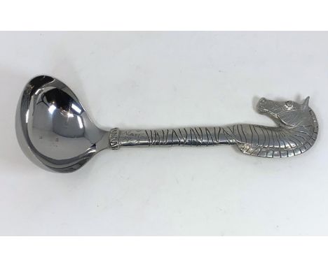 A Scandinavian large ladle with zebra shaped finial, signed 'Nimn van Kpop' 