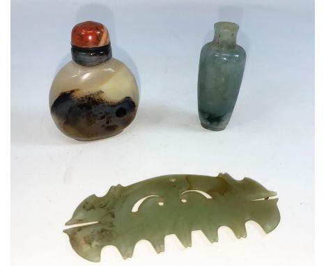 A Chinese jade coloured hard stone comb, a small jade coloured snuff bottle and another3 pieces all in good condition