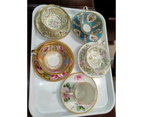 A selection of cabinet cups and saucers