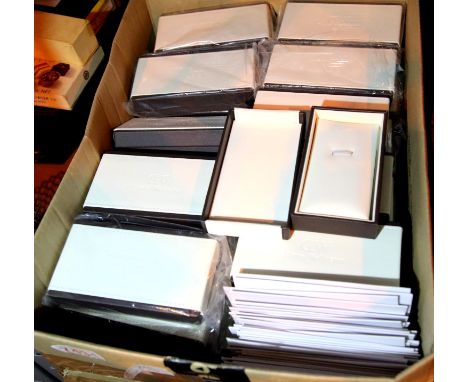Forty unused designer watch boxes with tools. P&amp;P Group 2 (£18+VAT for the first lot and £3+VAT for subsequent lots) 