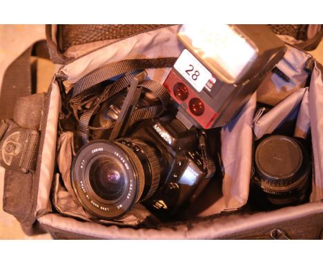 Case holder containing a Minolta Dynax 500 51 camera, a Cobra 700AF-M-1 auto focus flash unit and accessories. P&amp;P group 