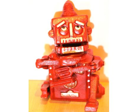 Cast iron sad robot moneybox, H: 17 cm. P&amp;P Group 1 (£14+VAT for the first lot and £1+VAT for subsequent lots) 