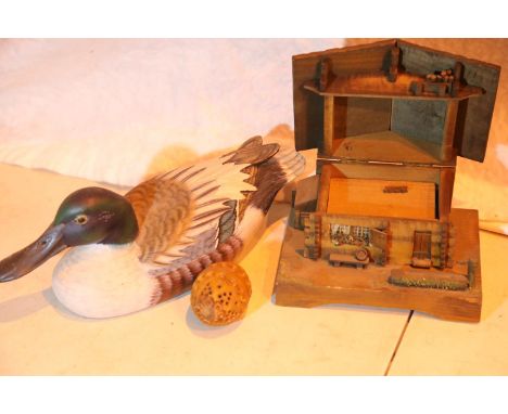 Musical wooden Swiss cottage, a wooden duck and a carved wood thread holder. P&amp;P Group 3 (£25+VAT for the first lot and £