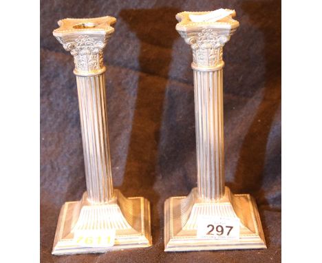 Two metal candlesticks, H: 20 cm approximately. P&amp;P group 2 (£18+VAT for the first lot and £3+VAT for subsequent lots) 