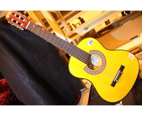 Child's Mad About acoustic guitar with carry case. P&amp;P Group 3 (£25+VAT for the first lot and £5+VAT for subsequent lots)