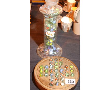 Hand turned solitaire game with marbles and a further jar of marbles. P&amp;P Group 3 (£25+VAT for the first lot and £5+VAT f