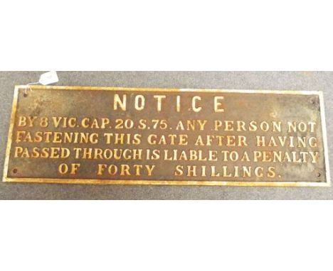 A cast iron railway notice sign, ANY PERSON NOT FASTENING THIS GATE AFTER HAVING PASSED THROUGH IS LIABLE TO A PENALTY OF FOR