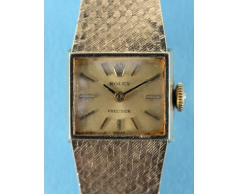 A lady's 9ct gold Rolex Precision wristwatch, with baton indices and integral mesh strap, the movement, dial and case all sig