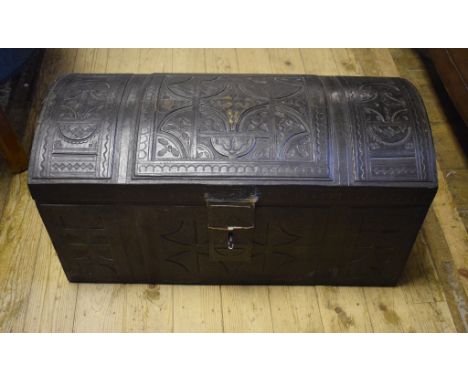 An Arts & Craft leather trunk, with tooled decoration, 80 cm wide