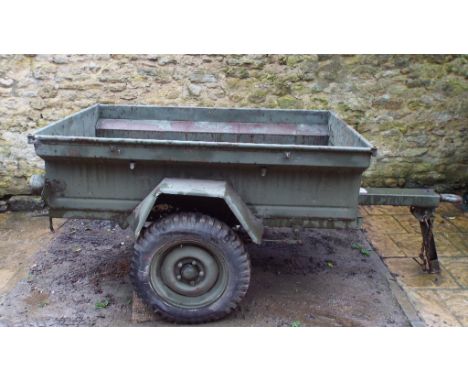 A US Army style Jeep type ¼ ton cargo trailer