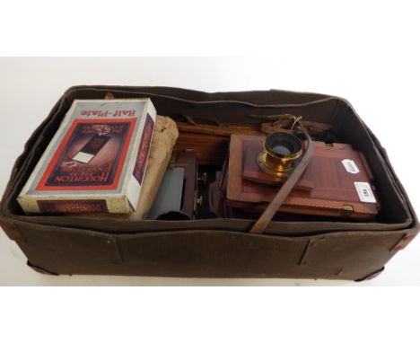 A late Victorian mahogany plate camera and accessories (box)