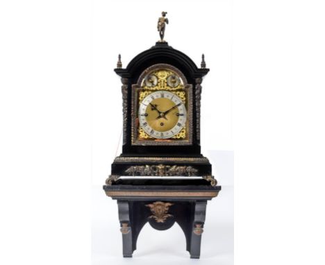 A late 19th century bracket clock, the 16.5 cm arch square brass dial having a silvered annular chapter ring and Roman numera