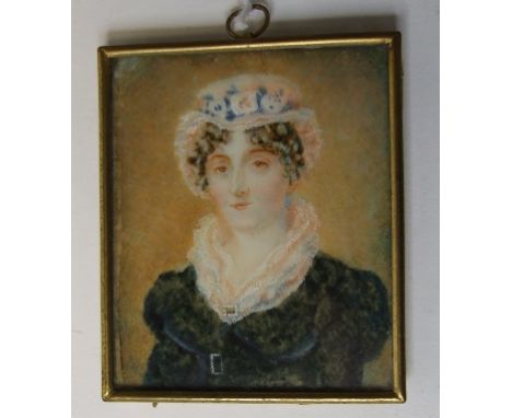 A bust portrait miniature, of a lady wearing a lace collar, watercolour, 7.5 x 6 cm