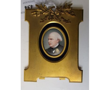 An enamel bust portrait miniature, of a gentleman, signed L Porret (?), 4 x 3 cm