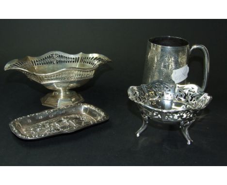 A Victorian silver christening mug, monogrammed and dated, with engraved decoration, London 1883, a silver basket with pierce