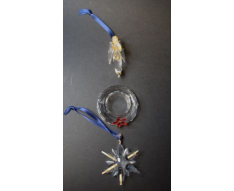 Assorted Swarovski Crystal Christmas decorations, including Christmas angel, 243453, all boxed (12)   Condition report  Repor