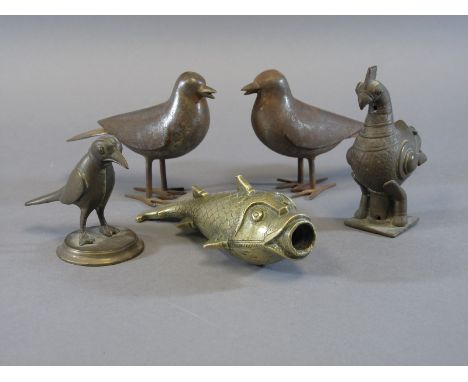 FIVE METAL BIRDS AND FISH India and Persia, 19th century comprising two Qajar steel birds, an Indian brass hamsa, an Indian b