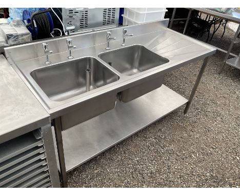 Commercial stainless steel double sink and drainer, hot and cold taps, under-tier shelf, two waste barrel plugsDimensions: He