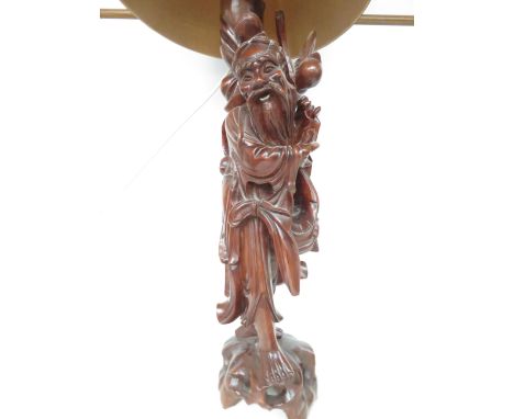 Wooden carved oriental figure converted into a lamp (Height 66 cm not including shade)
