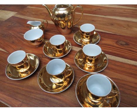 Tea set with 6 cups, 6 saucers, sugar bowl, milk jug &amp; teapot 