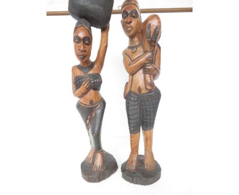 Pair of African carved wooden figures Height 72 cm 