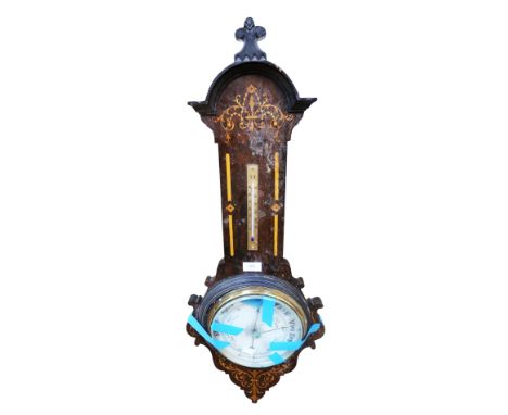 A 20th century inlaid wooden aneroid barometer, untested with cover loose and in need of repair.