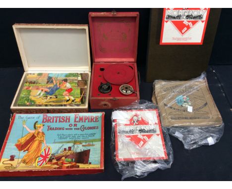 A collection of mid and early 20th Century children's games and toys to include The game of the British Empire, picture block