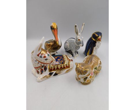 Five Royal Crown paperweights to include starlight hare, cottage garden cat, brown pelican, donkey, rock hopper penguin, all 