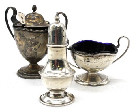 An Edwardian silver twin handled mustard pot and cover, of trophy shape on circular footed base, hallmarked Birmingham, 1907,
